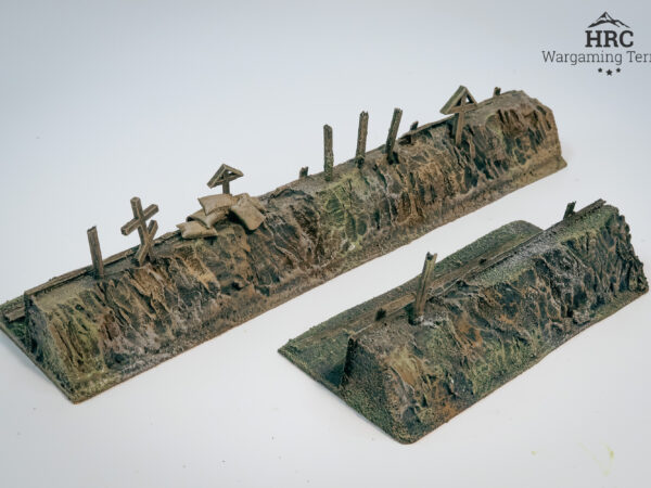 Detailed trench firing positions with scratched crosses and sandbags, ready-to-play wargaming scenery.